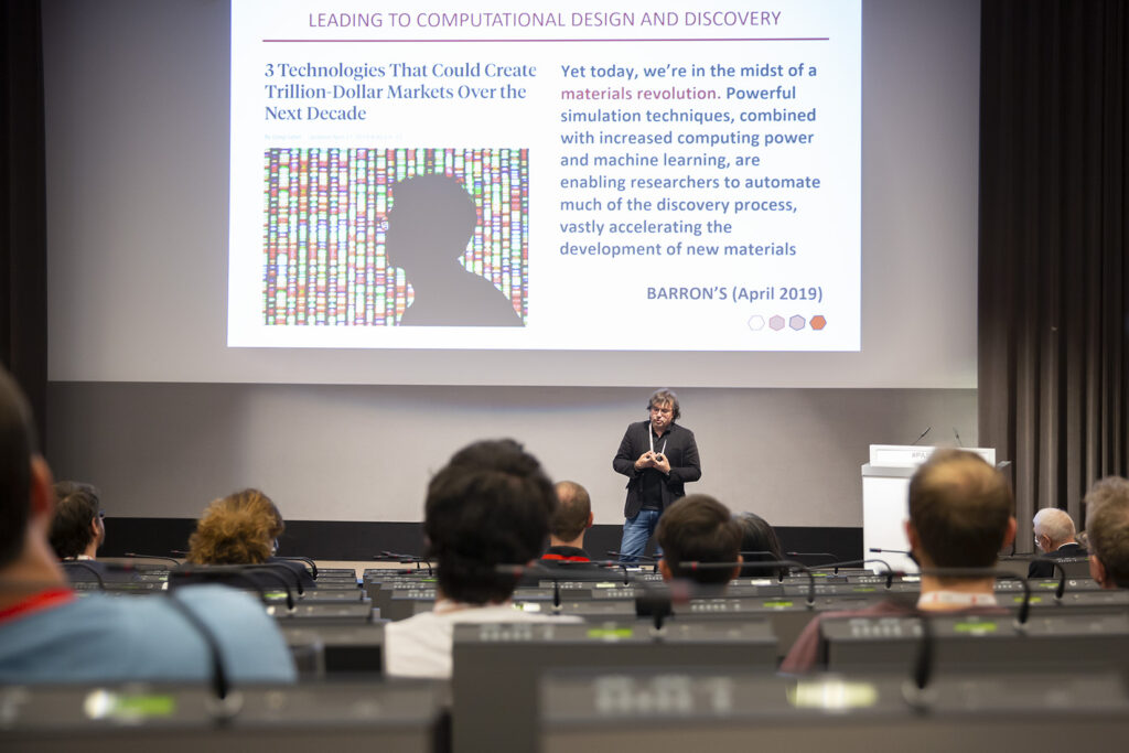 Nicola Marzari giving a presentation in an auditorium